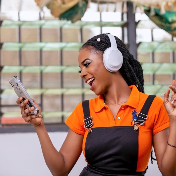 Alex Chen, Lead Design Curator at MarshGroveQuiet, reviewing corporate floral arrangements